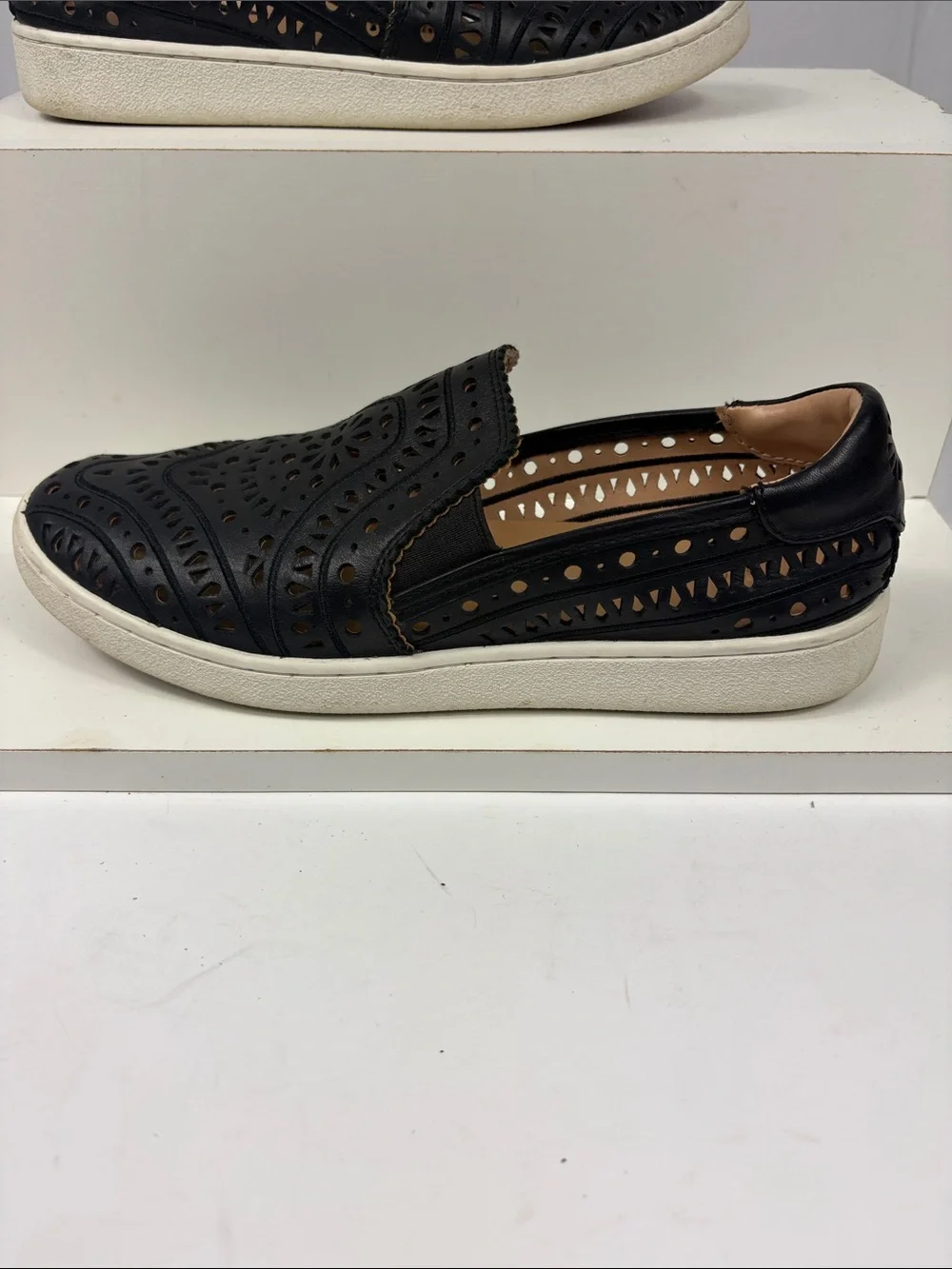 UGG CAS‎ Perforated Slip On Sneaker in Black.